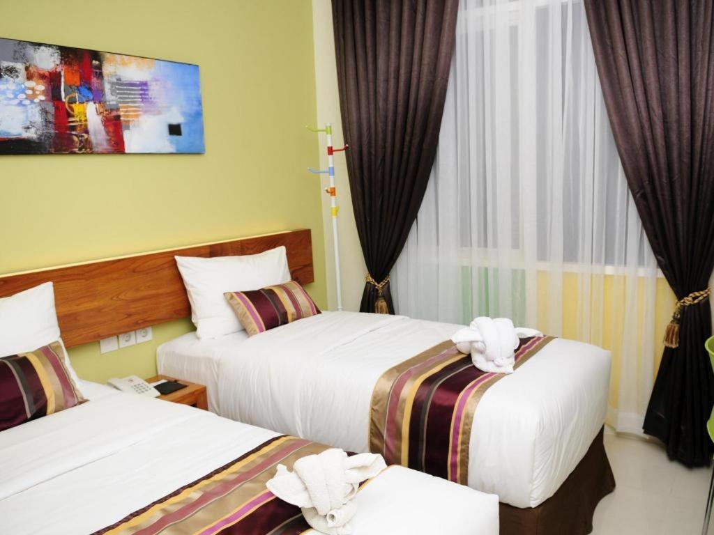 Biz Boulevard Hotel Манадо Экстерьер фото